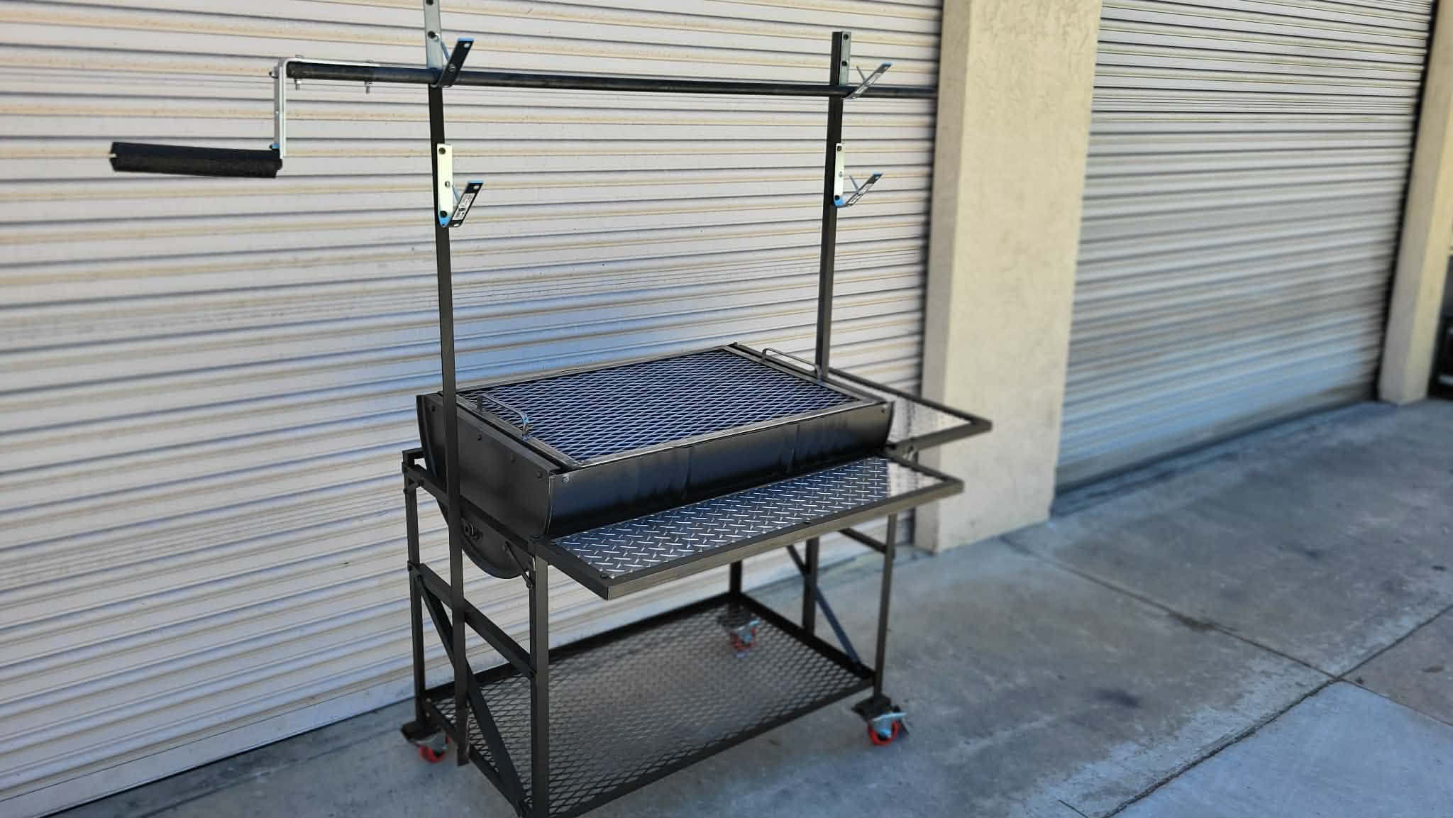 Portable outdoor BBQ grill cart with multiple shelves and hooks.